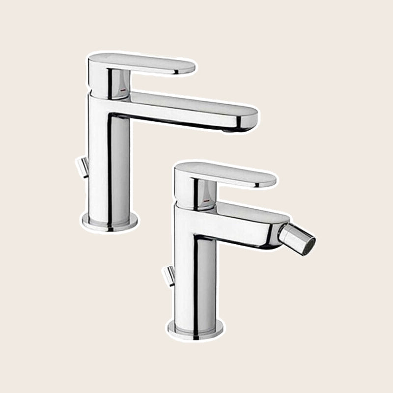 Paffoni Candy Coppia rubinetti Lavabo Bidet CA075HCR CA135CR Cromo ambientato su piano bagno con accessori