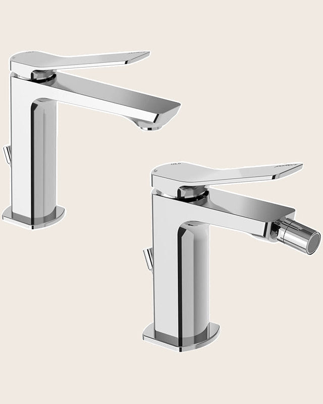 Paffoni tilt coppia miscelatori lavabo e bidet con scarico Cromo Lucido ambientato su piano bagno con accessori