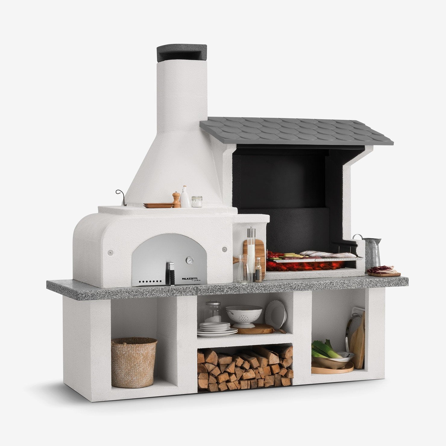 Palazzetti Antille 2 barbecue con forno a legna grezzo accesa in soggiorno, fiamma visibile attraverso il vetro