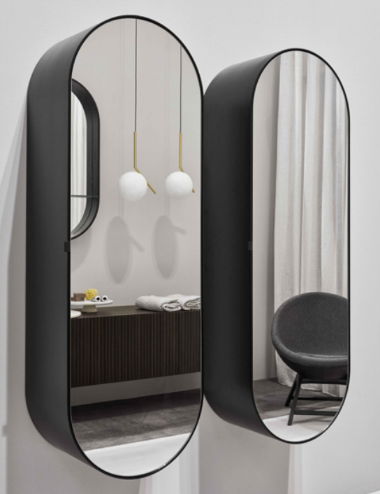 Cielo Arcadia Elio Specchio 50x145 Con Contenitore Nero Opaco ambientato in bagno moderno con specchio e accessori
