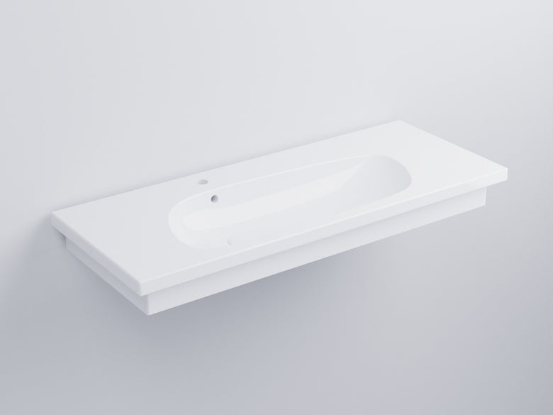 Cielo Enjoy Lavabo 120x48 Sospeso O Da Appoggio Con Piletta in ceramica e lucido ambientato su piano bagno con accessori