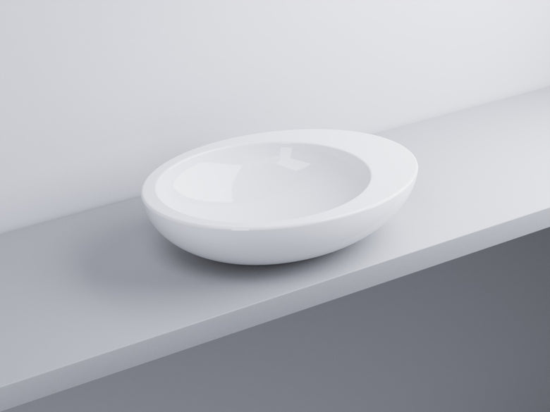 Cielo Le Giare lavabo da appoggio 60x45 senza troppopieno in ceramica e lucido ambientato su piano bagno con accessori