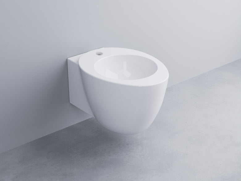 Cielo Le Giare bidet sospeso monoforo in ceramica bianco Bianca Lucida in lucido ambientato su piano bagno con accessori