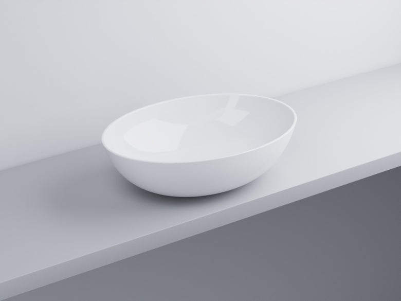Cielo Eco Small Bacinella 58x42 Ovale Da Appoggio Senza 00 Bianco in ceramica e lucido ambientato su piano bagno con...
