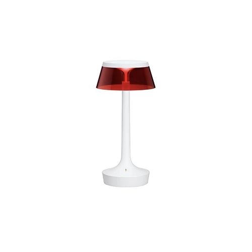 FLOS Bon Jour Unplugged Lampada da tavolo Ricaricabile Bianca accesa in ambiente, design e diffusione della luce