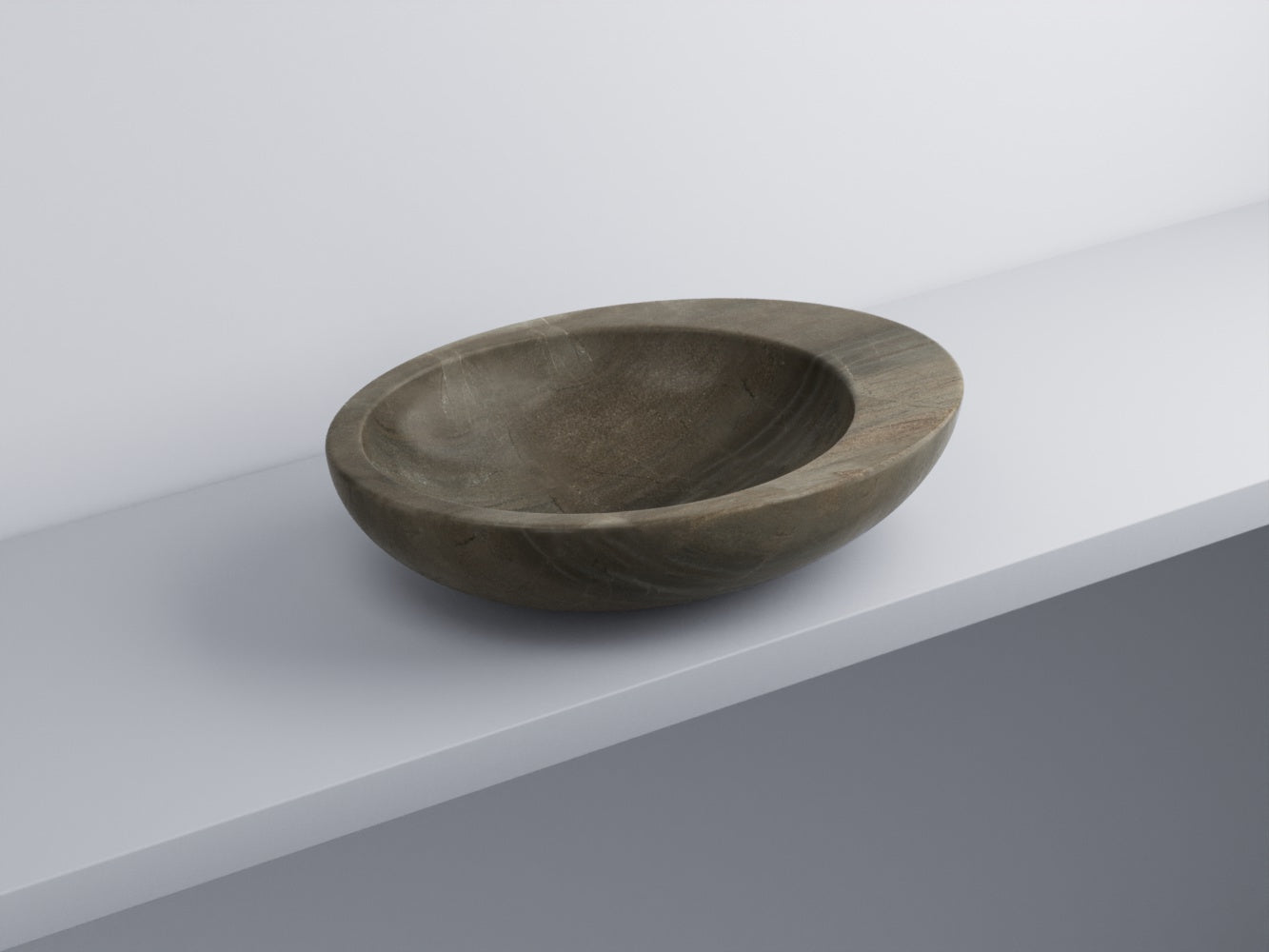 Cielo Le Giare lavabo da appoggio 60x45 senza troppopieno in ceramica ambientato su piano bagno con accessori