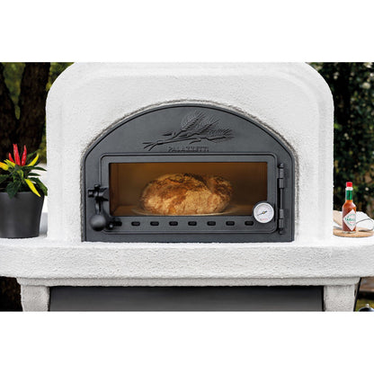 Palazzetti Capri 3 barbecue a legna con forno esterno in acciaio con piano in Marmotech effettto granito grigio