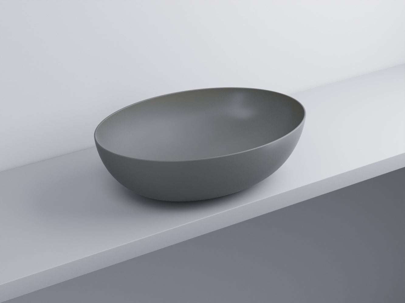 Cielo Eco Bacinella 62x45 Ovale Da Appoggio Senza Troppo in ceramica ambientato su piano bagno con accessori