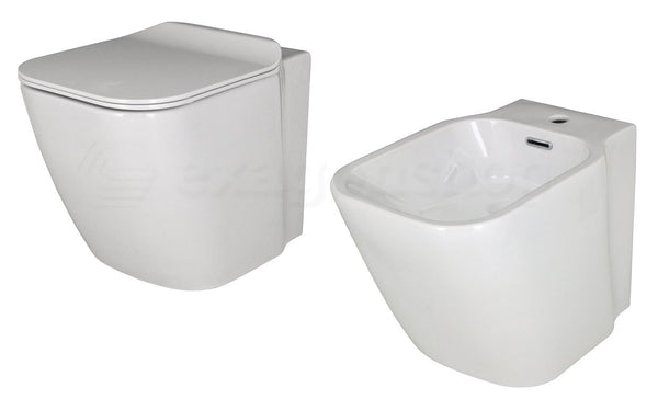 Coppia sanitari filo muro a pavimento bidet e vaso con sedile rallentato bianco lucido Porcelanosa Noken Essence C