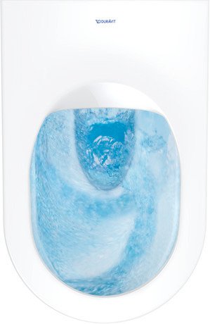 Coppia sanitari vaso e bidet sospesi senza brida con sedile ambientato su piano bagno con accessori