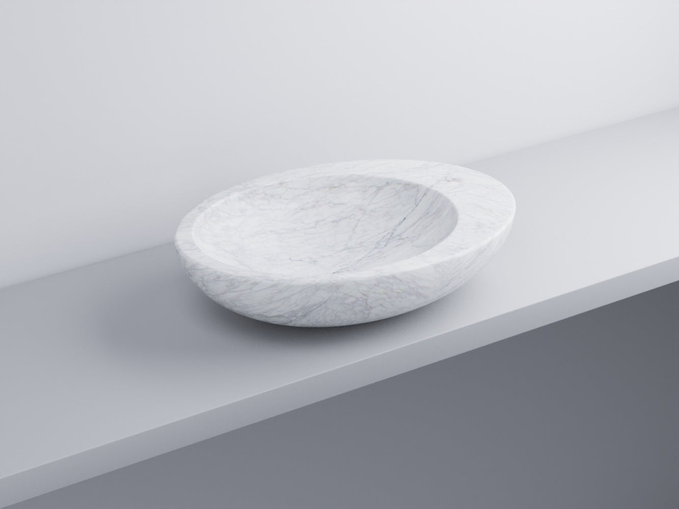Cielo Le Giare lavabo da appoggio 60x45 senza troppopieno Marmo Bianco in ceramica ambientato su piano bagno con accessori