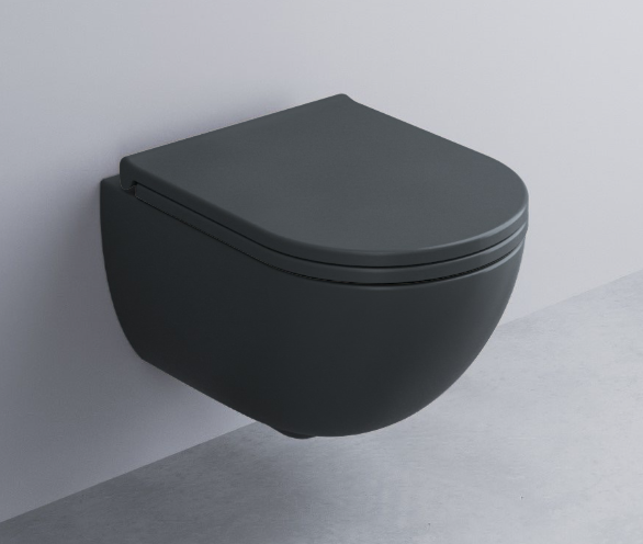 Cielo Enjoy Wc Sospeso 54x35 Senza Brida Completo Di Basalto in ceramica ambientato su piano bagno con accessori