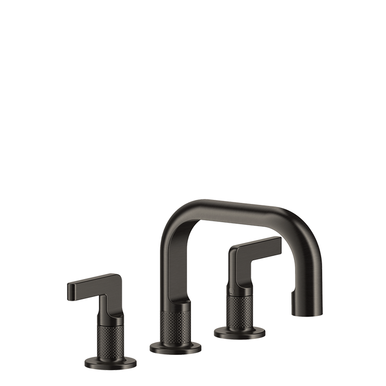 Gessi Inciso Gruppo lavabo 3 fori con bocca senza scarico ambientato su piano bagno con accessori