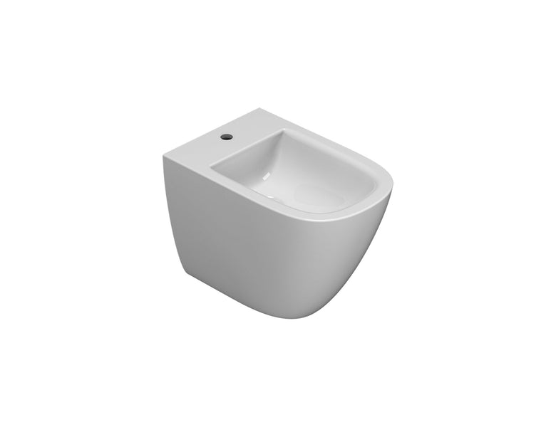 Ceramica Globo Stockholm Multi Bidet filo parete a in opaco ambientato su piano bagno con accessori