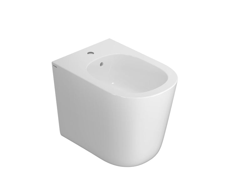 Globo Lalita Bidet Filo Parete A Pavimento In Ceramica 00 Bianco in lucido ambientato su piano bagno con accessori...