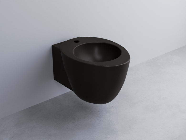 Cielo Le Giare Bidet sospeso monoforo completo di fissaggio in ceramica ambientato su piano bagno con accessori