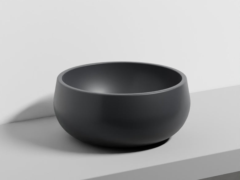 Cielo Tino bacinella 43 cm lavabo da appoggio senza in ceramica ambientato su piano bagno con accessori