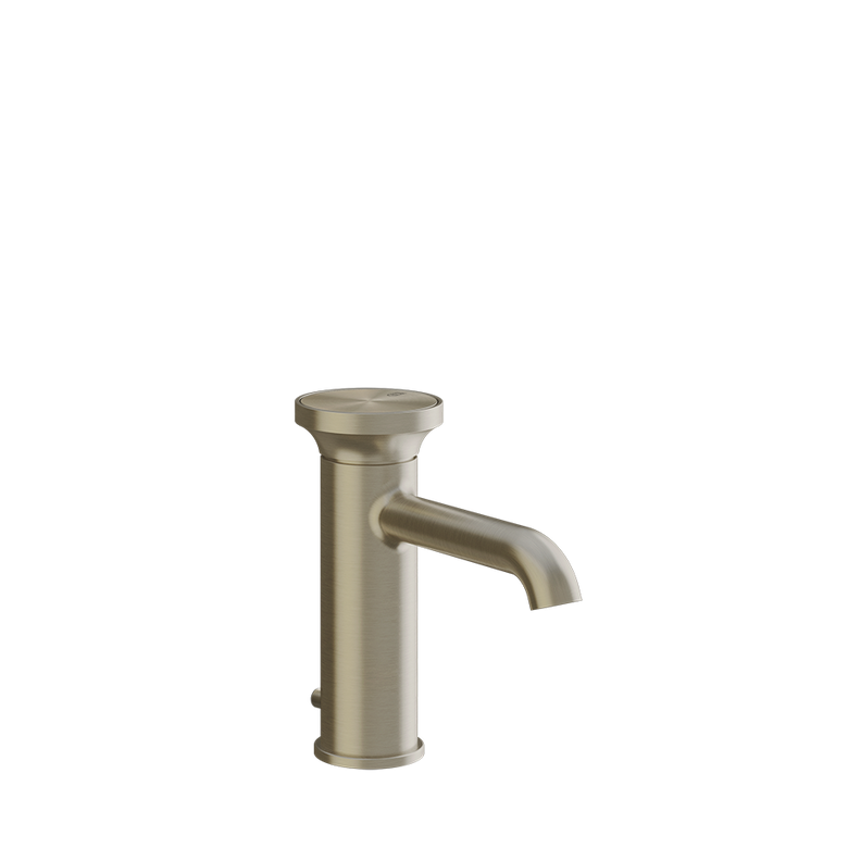 Gessi Miscelatore lavabo monocomando con scarico brass in ottone e spazzolato ambientato su piano bagno con accessori