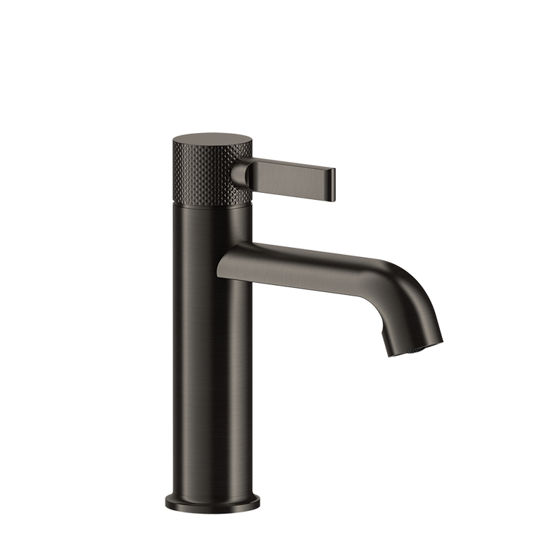 Gessi Inciso Miscelatore lavabo monocomando con scarico ambientato su piano bagno con accessori