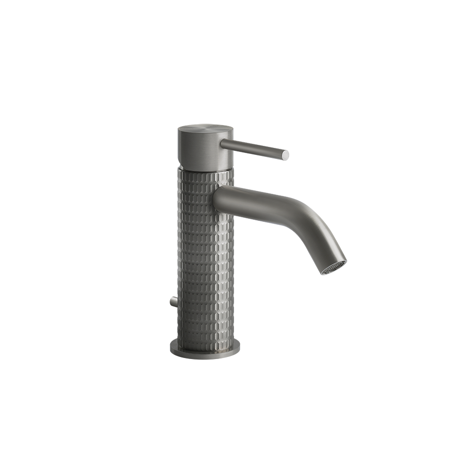 Gessi Meccanica Miscelatore lavabo monocomando con scarico ambientato su piano bagno con accessori