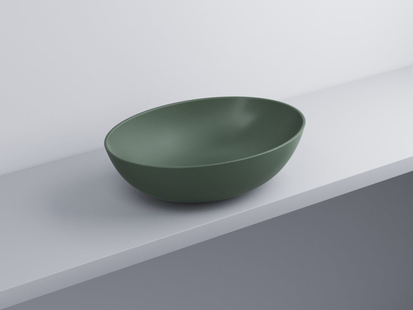 Cielo Eco Small Bacinella 58x42 Ovale Da Appoggio Senza in ceramica e lucido ambientato su piano bagno con accessori