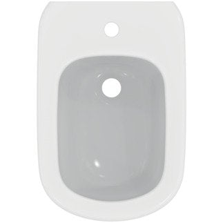 Ideal Standard Coppia sanitari sospesi vaso rimless e bidet ambientato su piano bagno con accessori