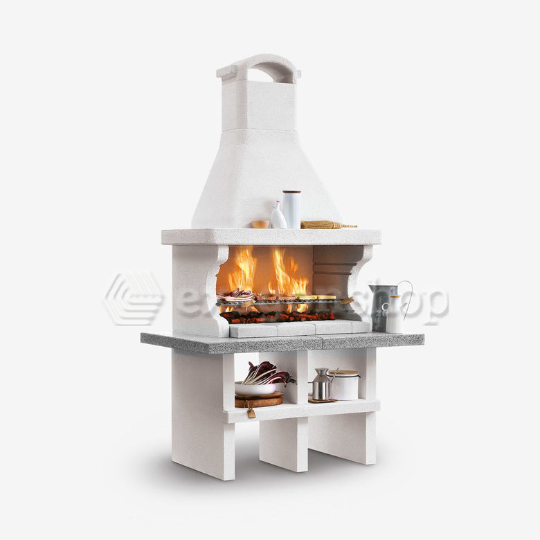 Palazzetti Pianosa barbecue a legna grezzo grill extralarge accesa in soggiorno, fiamma visibile attraverso il vetro