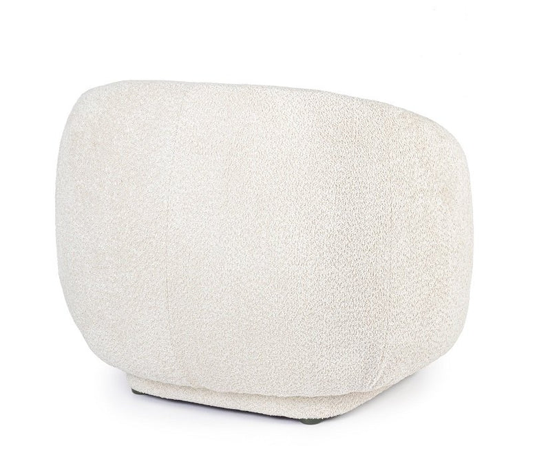 Andrea Bizzotto Tecla Poltrona Effetto Boucle Naturale ambientato in spazio living con arredi coordinati