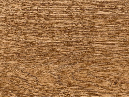 Pavimento chevron 11x54 effetto parquet in gres posata in ambiente arredato, dettaglio della venatura