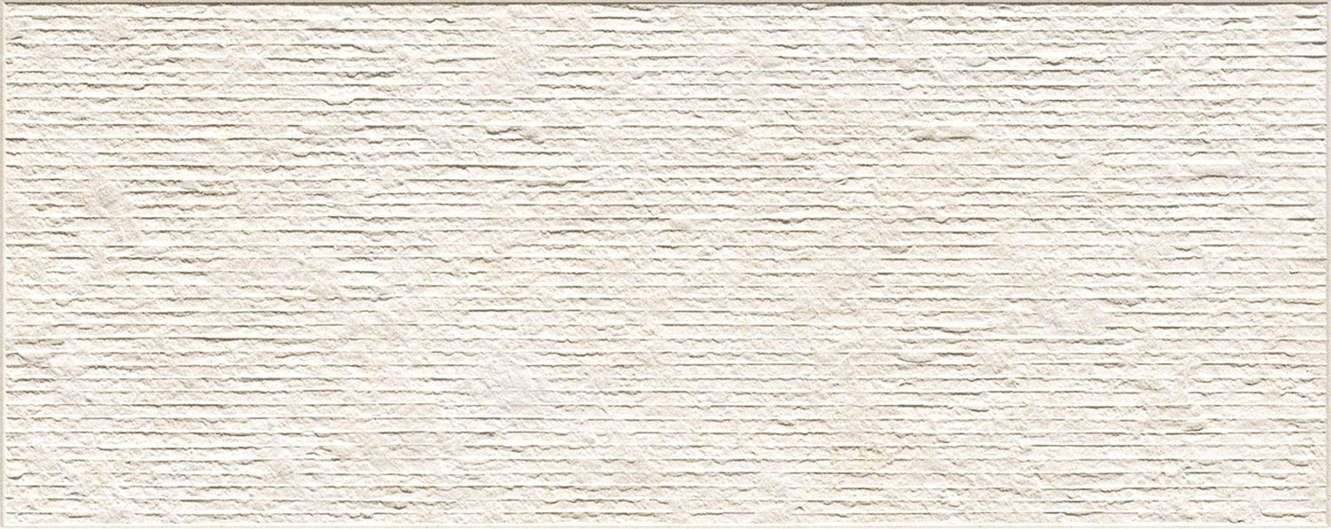Rivestimento 32X80,5 in pasta bianca rub trani Lithos Naxos posata in ambiente arredato, dettaglio della venatura