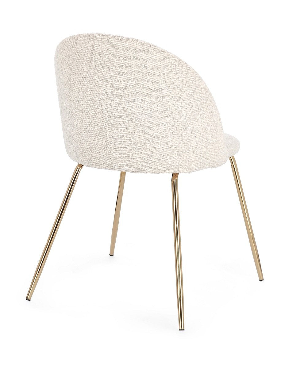 Andrea Bizzotto Tanya sedia effetto boucle avorio gambe oro ambientato in spazio living con arredi coordinati