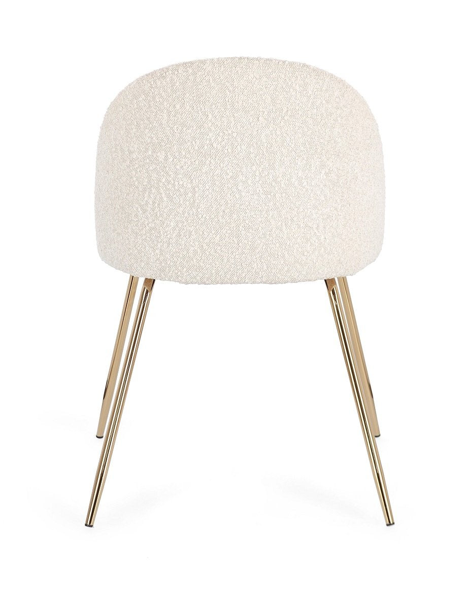 Andrea Bizzotto Tanya sedia effetto boucle avorio gambe oro ambientato in spazio living con arredi coordinati