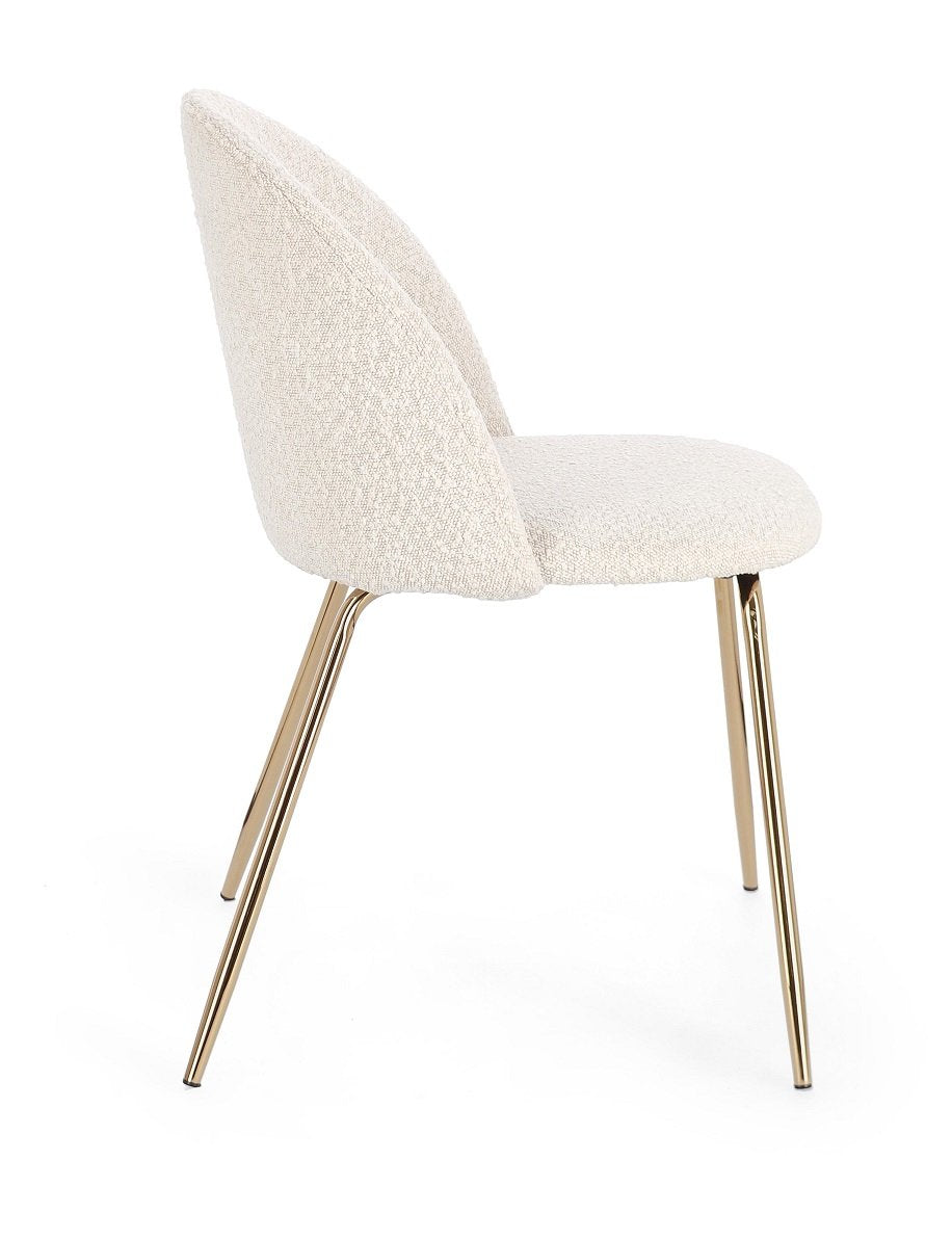 Andrea Bizzotto Tanya sedia effetto boucle avorio gambe oro ambientato in spazio living con arredi coordinati