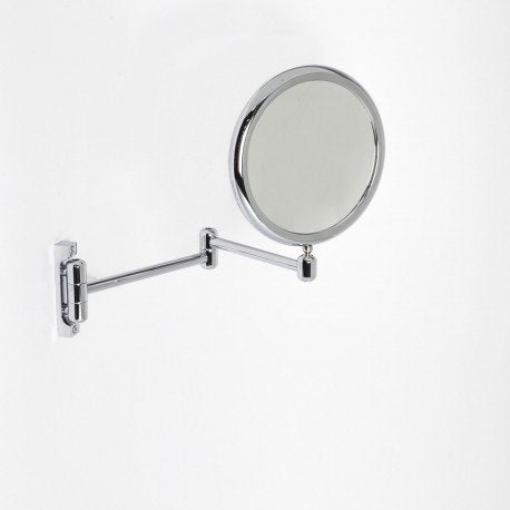 Specchio ingranditore x6 bifacciale 18 cm snodato a muro Cromo Lucido ambientato in bagno moderno con specchio e...