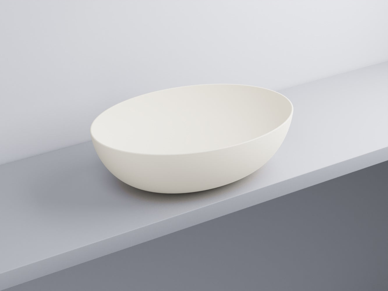 Cielo Eco Bacinella 62x45 Ovale Da Appoggio Senza Troppo in ceramica ambientato su piano bagno con accessori