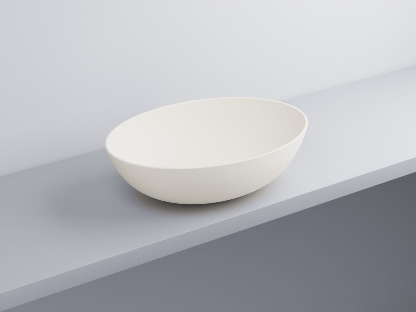 Cielo Eco Small Bacinella 58x42 Ovale Da Appoggio Senza in ceramica ambientato su piano bagno con accessori