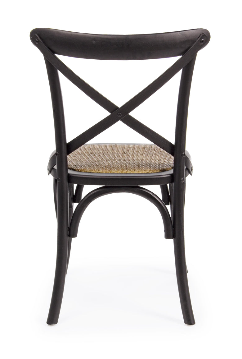 Andrea Bizzotto Cross Country sedia in rattan naturale e ambientato in spazio living con arredi coordinati