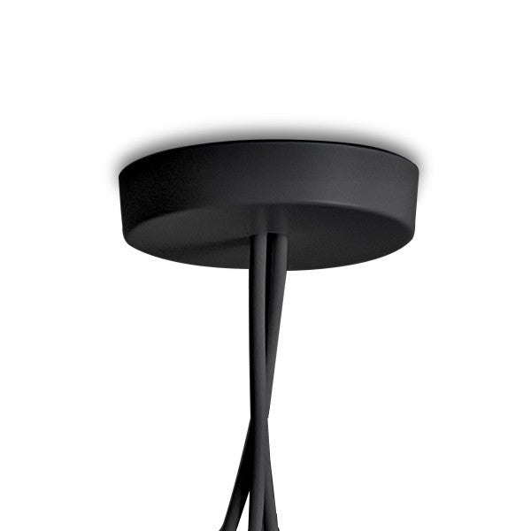 Flos Rosone multiplo Nero per Lampada Aim in policarbonato accesa in ambiente, design e diffusione della luce