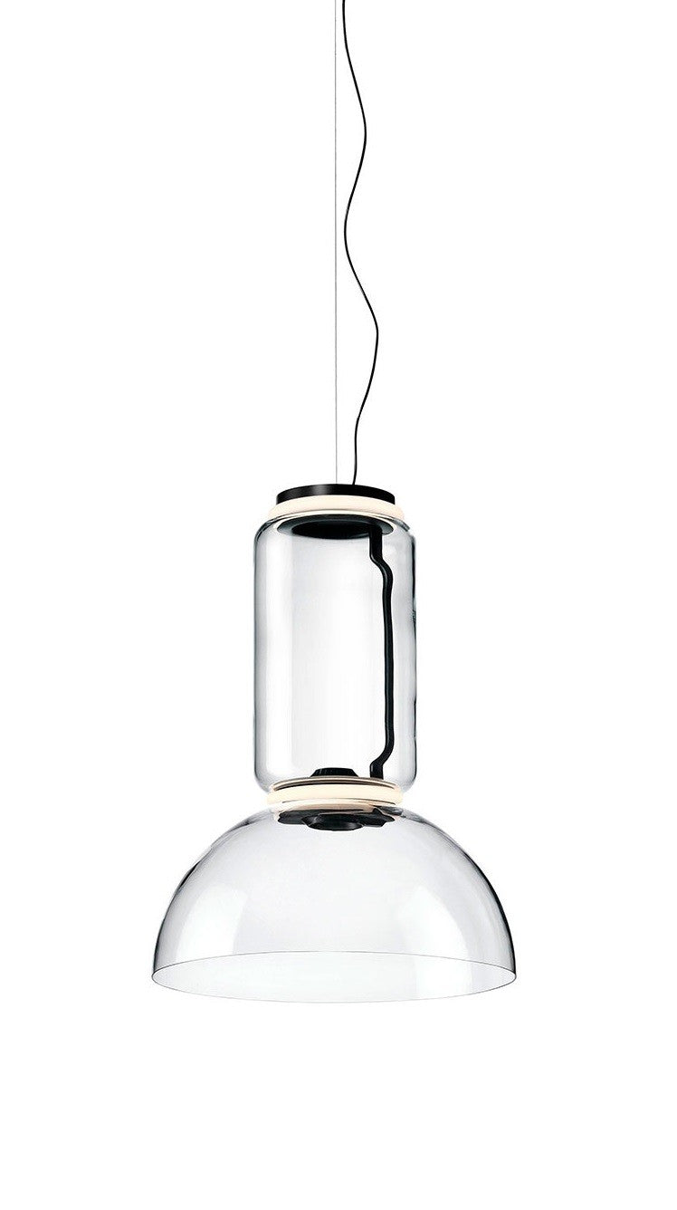 FLOS Noctambule Suspension 1 Lampada a sospensione Low Trasparente accesa in ambiente, design e diffusione della luce