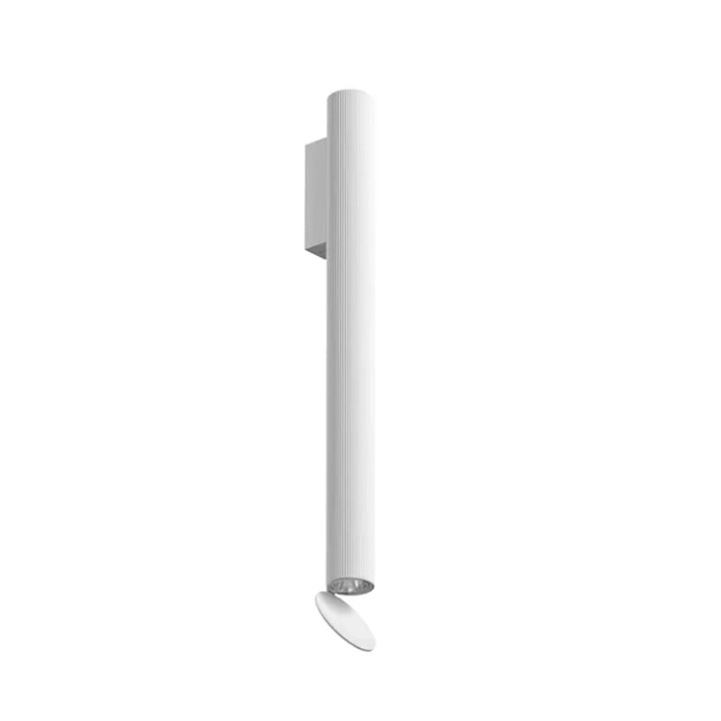 Flos Flauta H500 Riga Lampada indoor 50 cm a Parete bianco accesa in ambiente, design e diffusione della luce