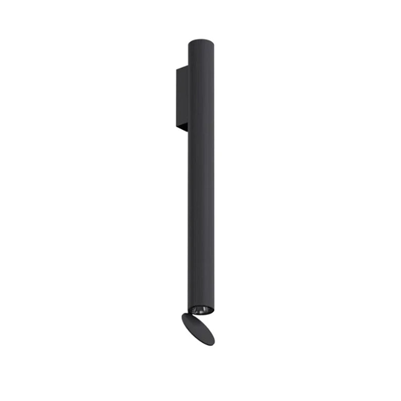 Flos Flauta H500 Riga Lampada indoor 50 cm a Parete Nero in alluminio accesa in ambiente, design e diffusione della luce