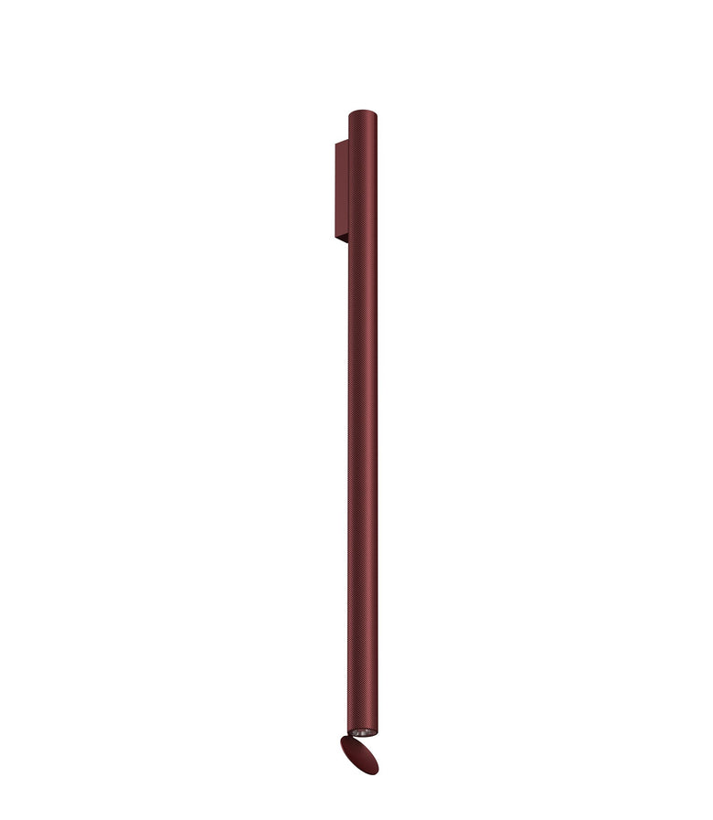 Flos Flauta Spiga Lampada indoor 100 cm a Parete Ruby Red Anodized Ruby Red accesa in ambiente, design e diffusione della...
